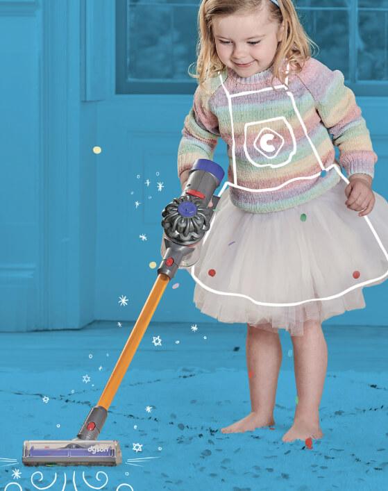 Child using Vacuum